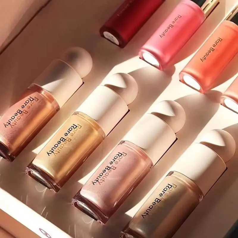 Raro beleza leve toque sedoso inovador iluminador à prova de transferência à prova de manchas resistente à água cosméticos de maquiagem de longa duração