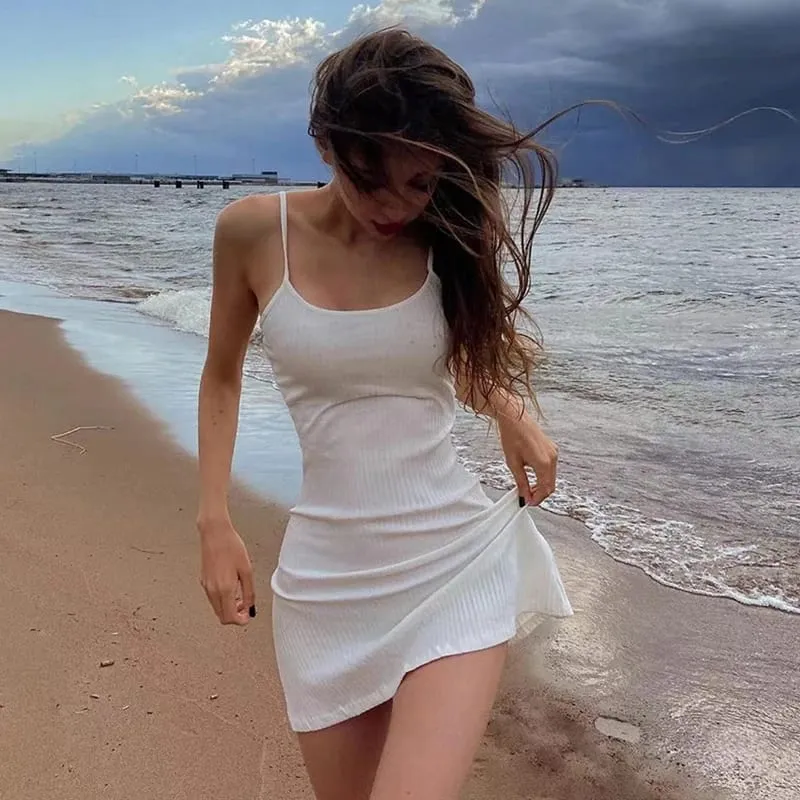 Women's Summer Mini Slim Dress Solid Color Ribbed Sleeveless Camisole Dress Revealing Backpack Buttocks Beach Vacation Dress — image 1