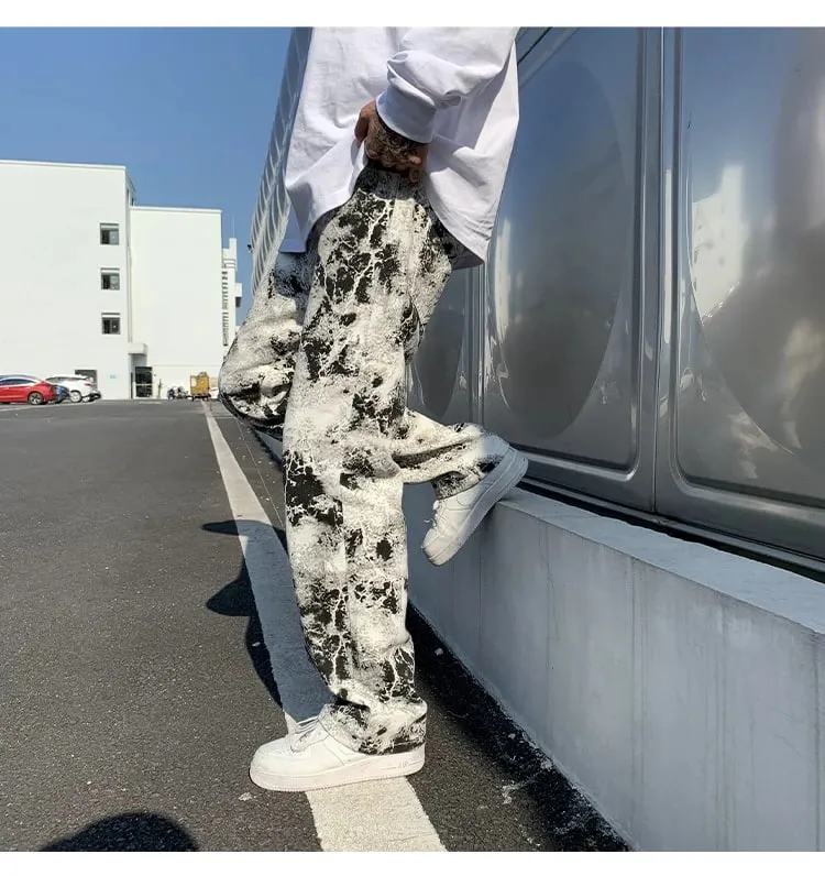 Calças de brim impressas unissex cintura elástica primavera 2025 esfregar calças jeans moda masculina estilo coreano alta rua solta calças hip hop
