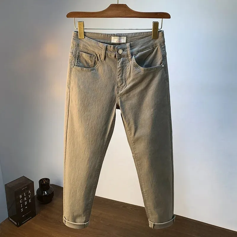 Calças de brim masculinas de luxo leve 2025 verão fino estiramento cônico pequeno perna reta casual versátil denim calças de cor sólida