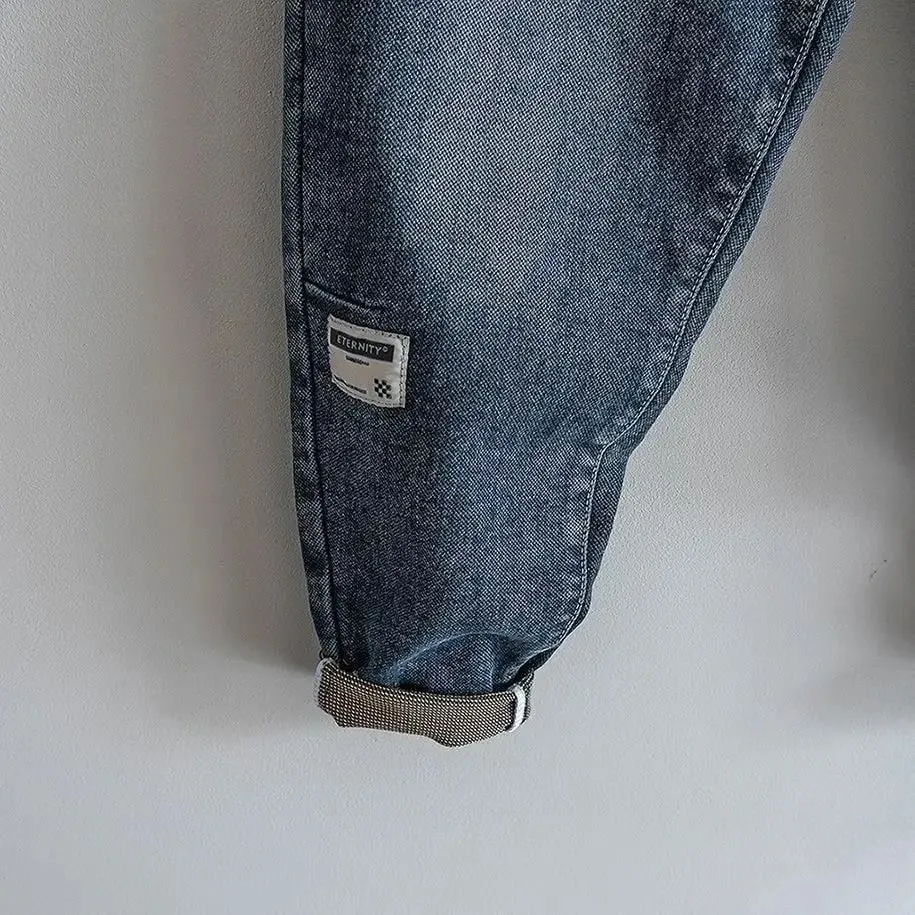 Solto cintura elástica denim jeans primavera outono emendado harem calças casuais masculinas 2024 coreano novo estiramento baggy carga jeans