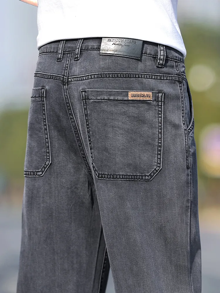 Calças de brim finas masculinas de perna larga solta lyocell macio drape tecido conforto calças primavera verão marca de moda calças jeans de lavagem