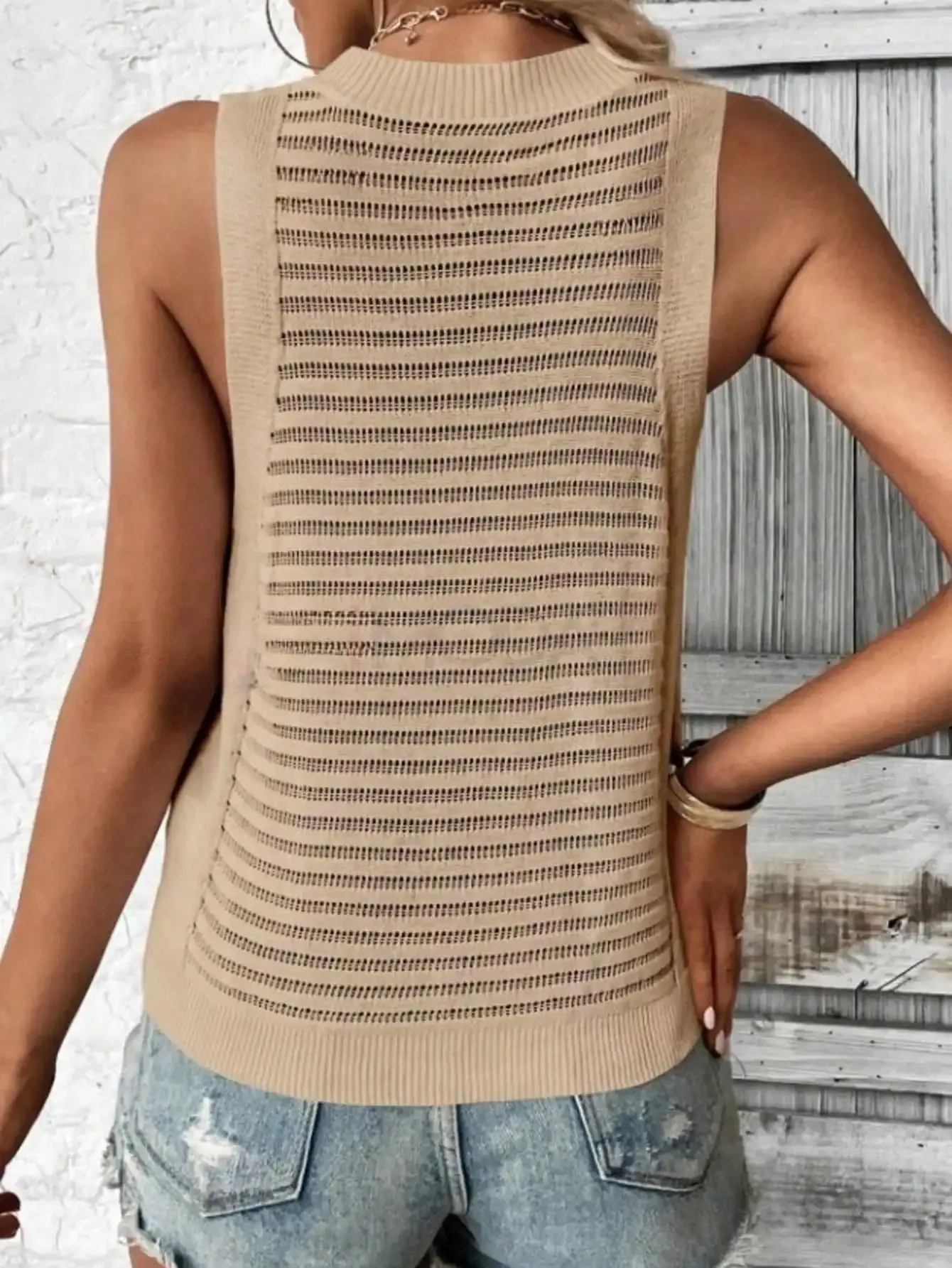Top feminino de malha de cor sólida sem mangas