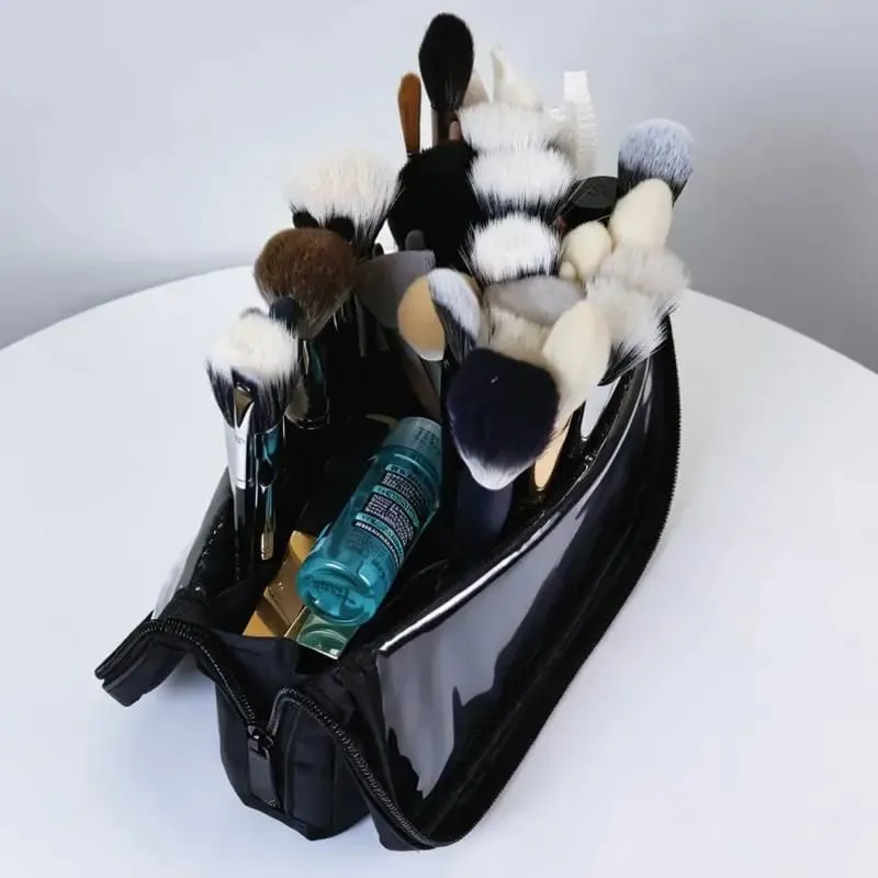 1pc dobrável maquiagem artista armazenamento pincéis de maquiagem bolsa stand-up pincéis de maquiagem saco de armazenamento com divisórias ajustáveis.