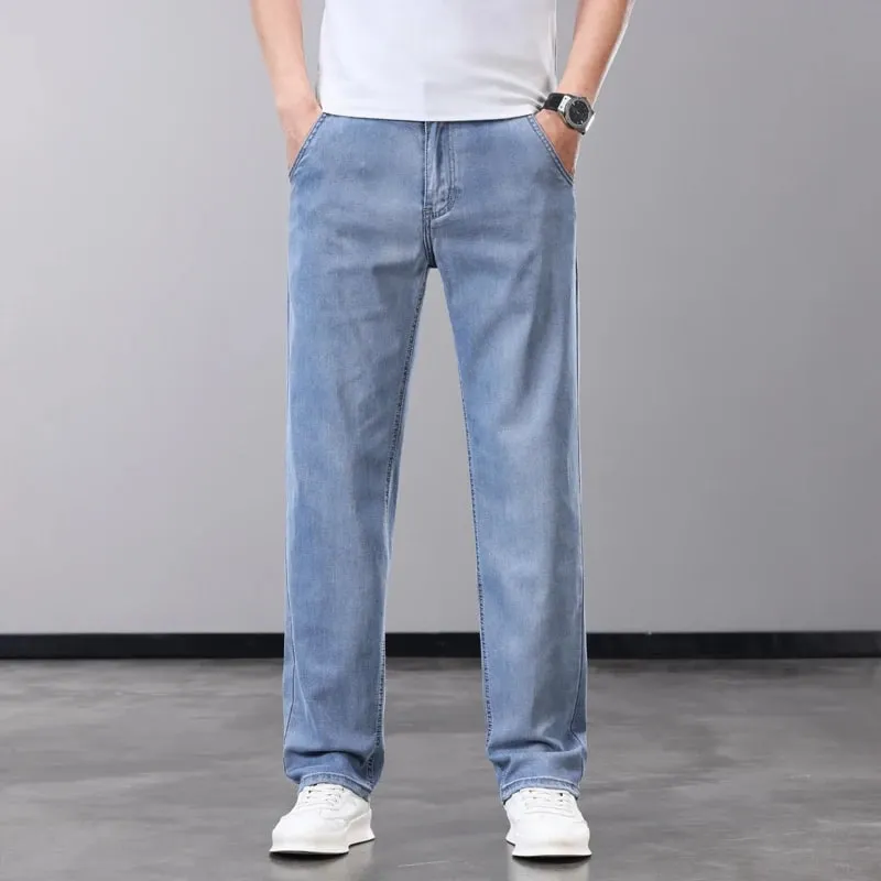 Verão fino jeans masculino lyocell tecido macio respirável calças jeans retas marca homem elástico de seda gelo calças casuais cinza azul