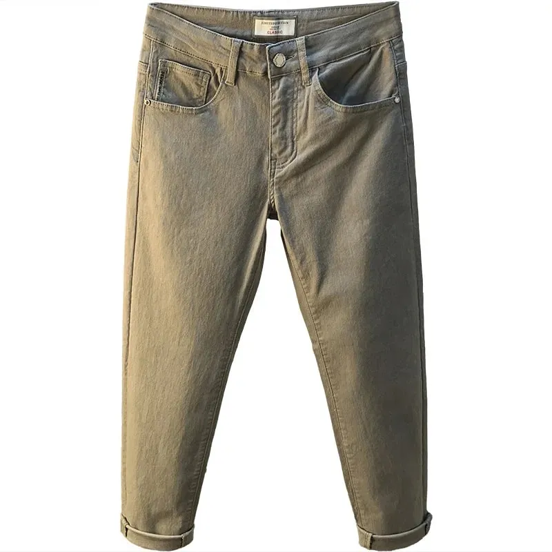 Calças de brim masculinas de luxo leve 2025 verão fino estiramento cônico pequeno perna reta casual versátil denim calças de cor sólida