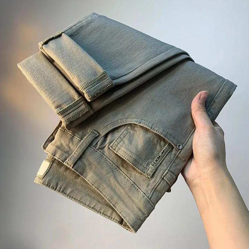 Calças de brim masculinas de luxo leve 2025 verão fino estiramento cônico pequeno perna reta casual versátil denim calças de cor sólida