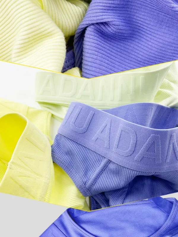1 Uds. Calzoncillos masculinos acanalados de Color sólido ADANNU Logo en relieve cintura elástica comodidad calzoncillos de Bikini diarios AD759