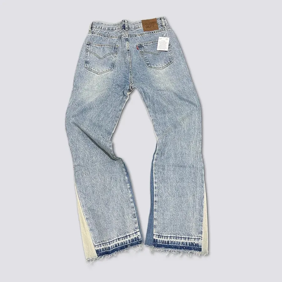 Calça jeans boca de sino lavada e gasta com patchwork