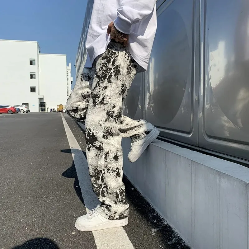 Calças de brim impressas unissex cintura elástica primavera 2025 esfregar calças jeans moda masculina estilo coreano alta rua solta calças hip hop