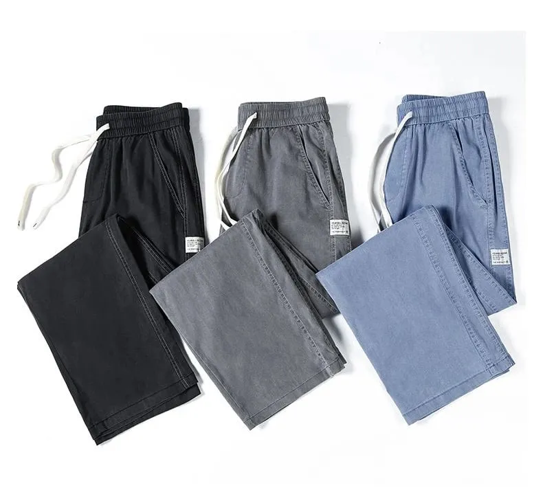 Verão masculino macio lyocell tecido jeans fino solto calças jeans retas cordão cintura elástica calças casuais plus size M-5XL