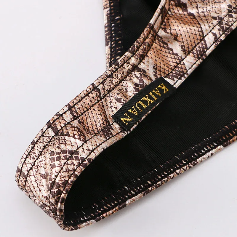 Cuecas masculinas estampadas de pele de cobra com bolsa de protuberância sexy cueca de biquíni confortável da marca WANGJIANG