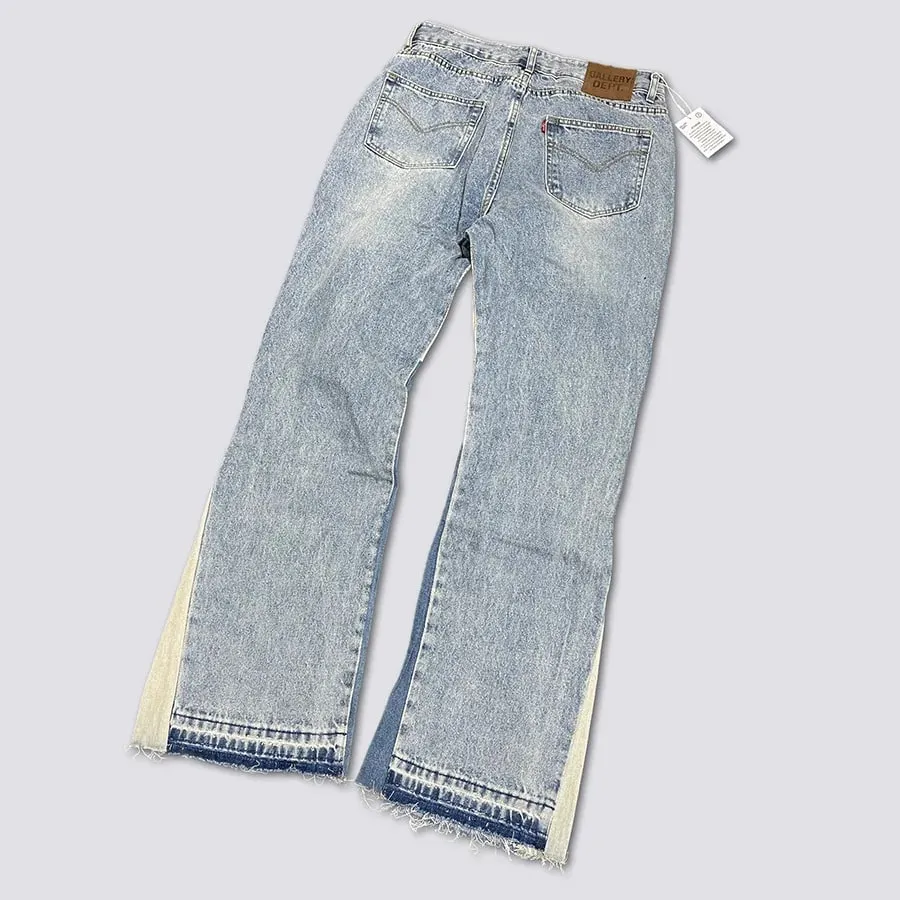 Calça jeans boca de sino lavada e gasta com patchwork