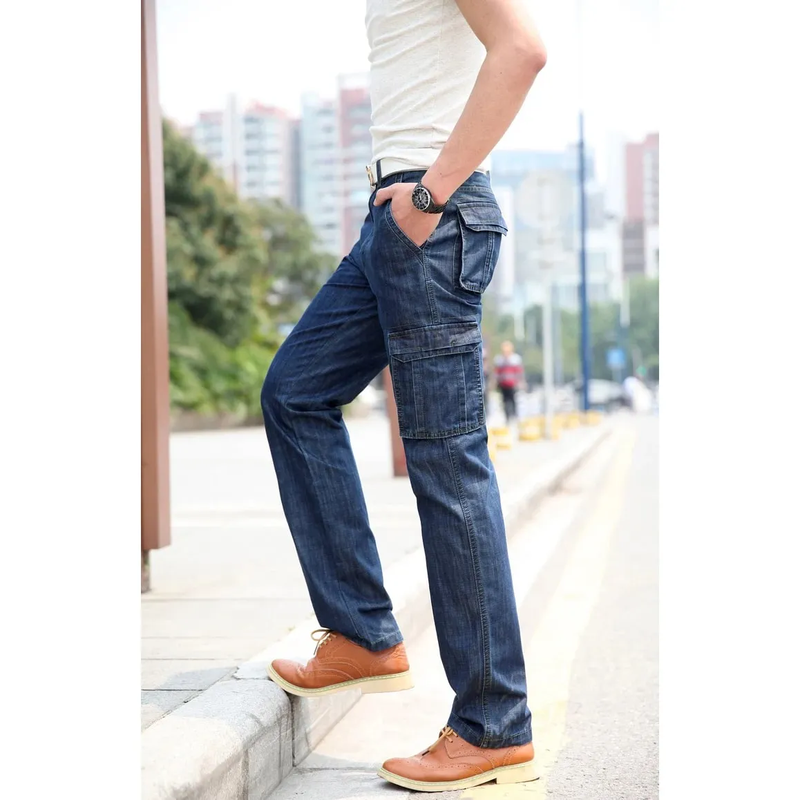 Calças de brim masculinas de alta qualidade multi bolso denim calças de carga calças casuais de grandes dimensões roupas masculinas calças soltas 29-44