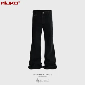 ริบบิ้นยืดเล็กน้อย Baggy Flared กางเกงยีนส์ผู้ชาย High Street สีดำ Boom Cut ขนาดใหญ่ Casual Denim กางเกง