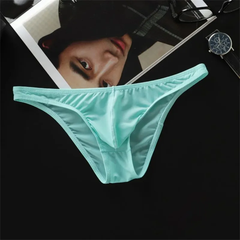 ¡Novedad de 2026! Calzoncillos pequeños convexos en U de seda hielo para hombre, ropa interior de cintura baja, Bikini transparente ultrafino, bragas deslizantes de talla grande M-XXL
